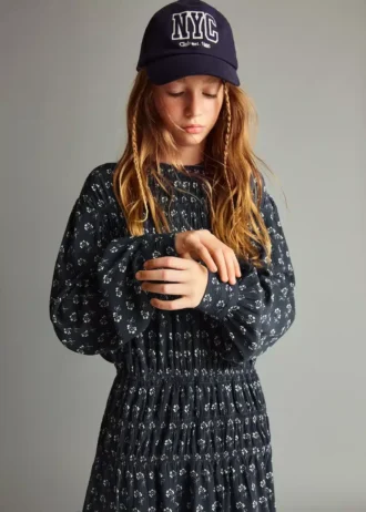 Abito con maniche a sbuffo floreali