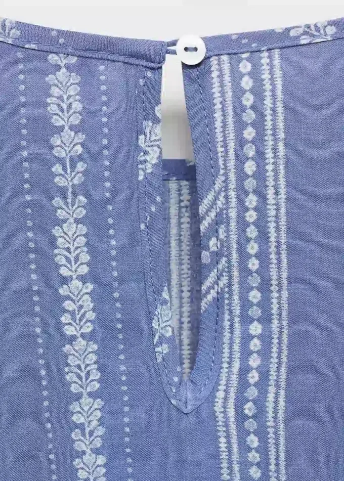 Abito con ricami floreali Abito con ricami floreali