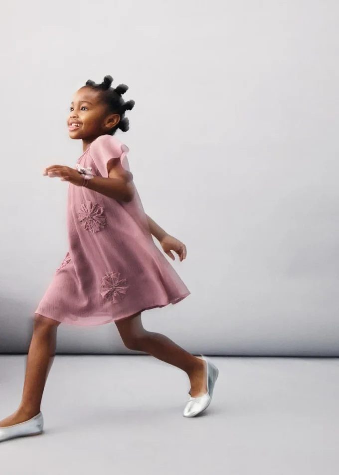 Abito con ricami in perline Abito con ricami in perline