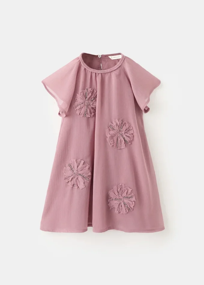 Abito con ricami in perline Abito con ricami in perline