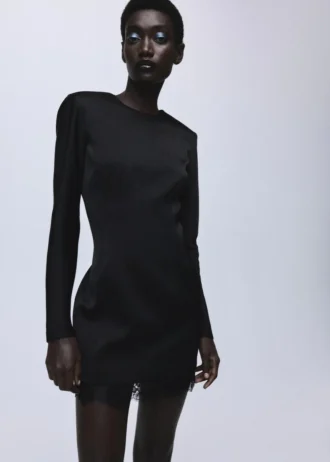 Abito con schiena scoperta e orlo con bordino in pizzo