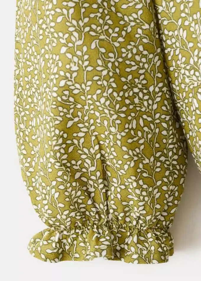 Abito e tutina con volant Abito e tutina con volant