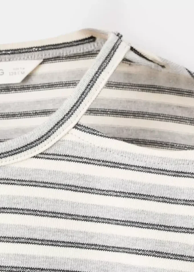 Abito in lurex con cut-out Abito in lurex con cut-out