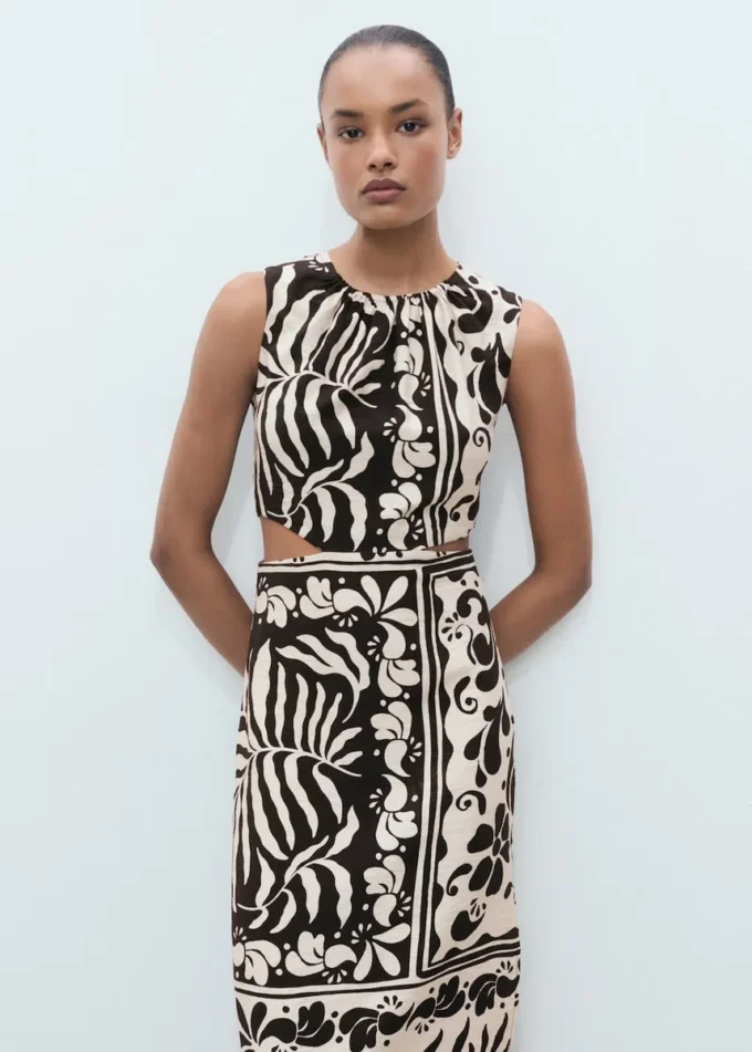 Abito midi con cut-out Abito midi con cut-out