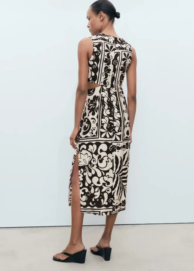 Abito midi con cut-out Abito midi con cut-out