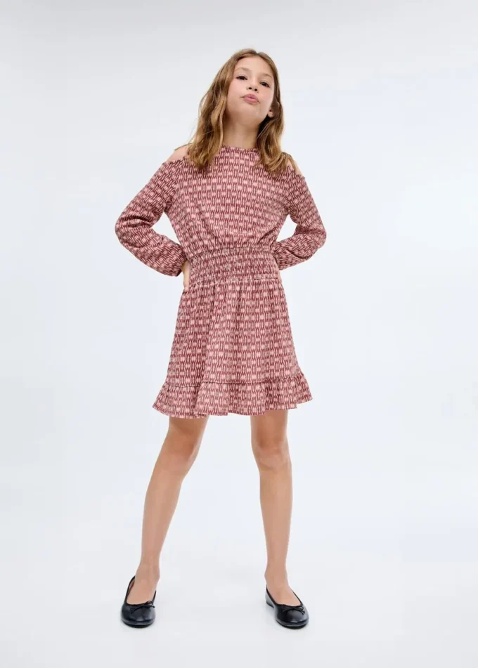 Abito stampato con ruches