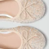 Ballerine glitterate con fiocco