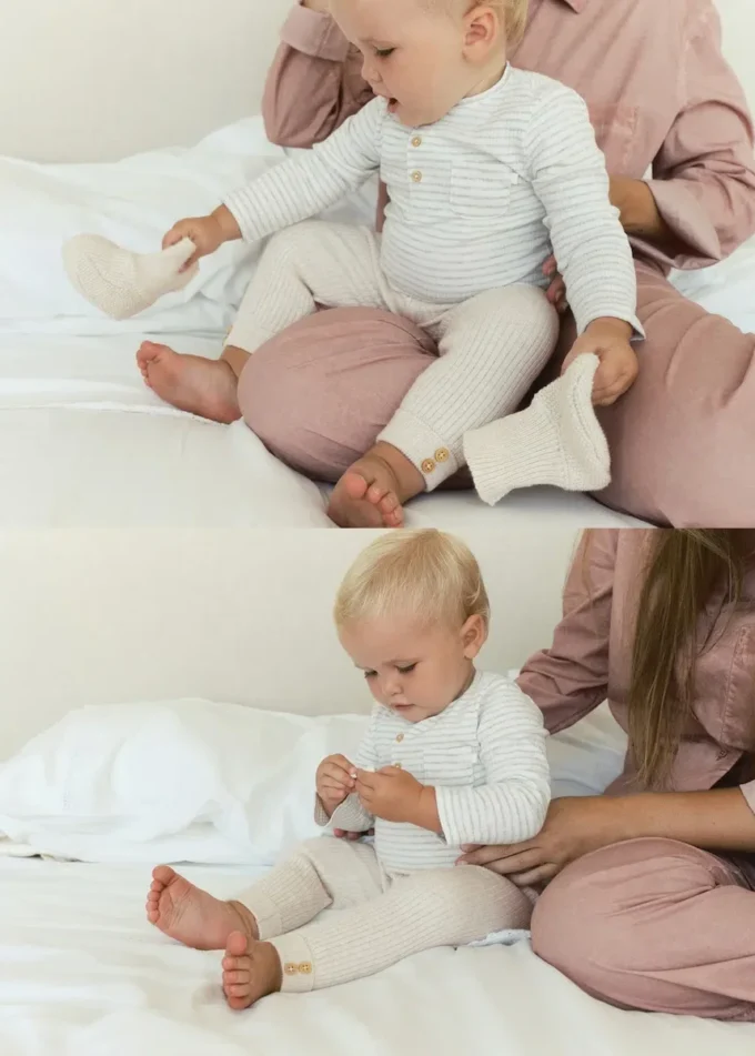 Body a righe in cotone per neonati Body a righe in cotone per neonati