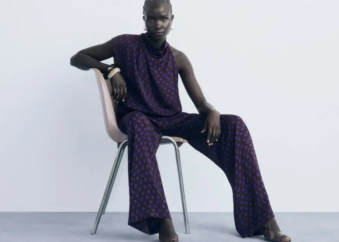 Camicetta a pois con collo drappeggiato