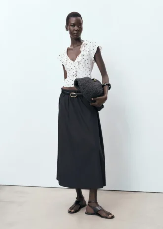 Camicetta a pois con volant