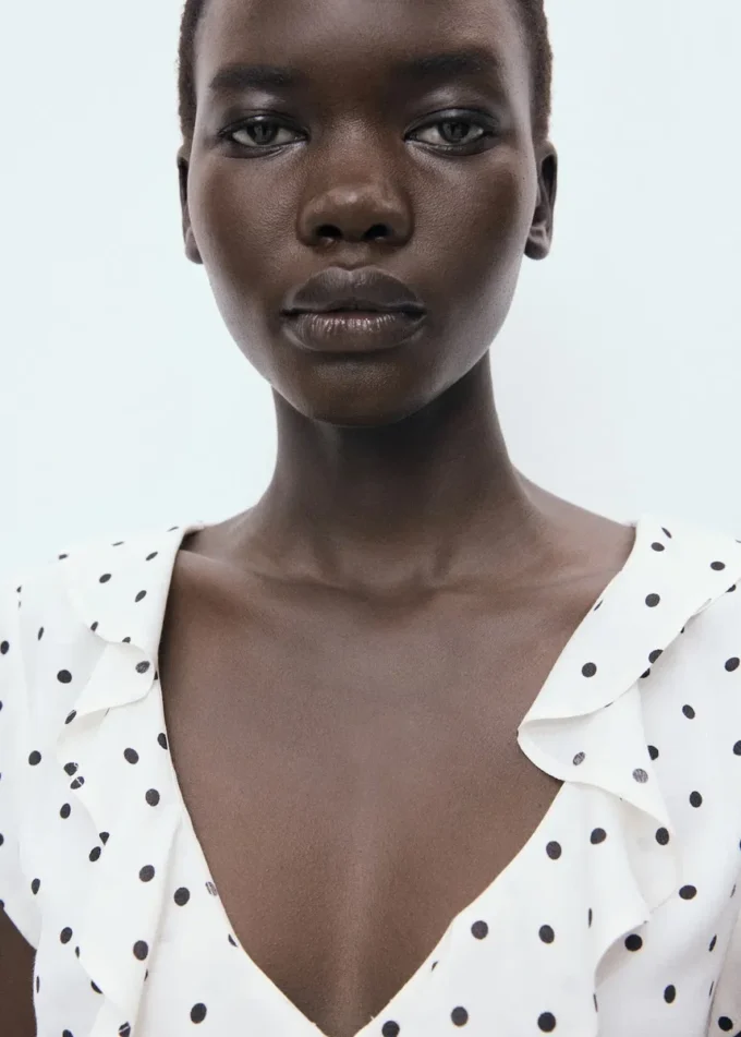 Camicetta a pois con volant