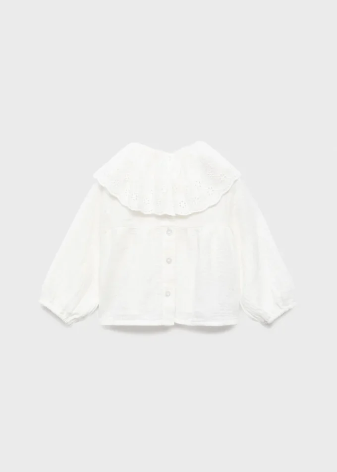Camicetta con collo babydoll ricamato Camicetta con collo babydoll ricamato