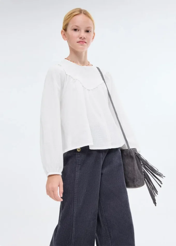 Camicetta con dettagli in pizzo Camicetta con dettagli in pizzo