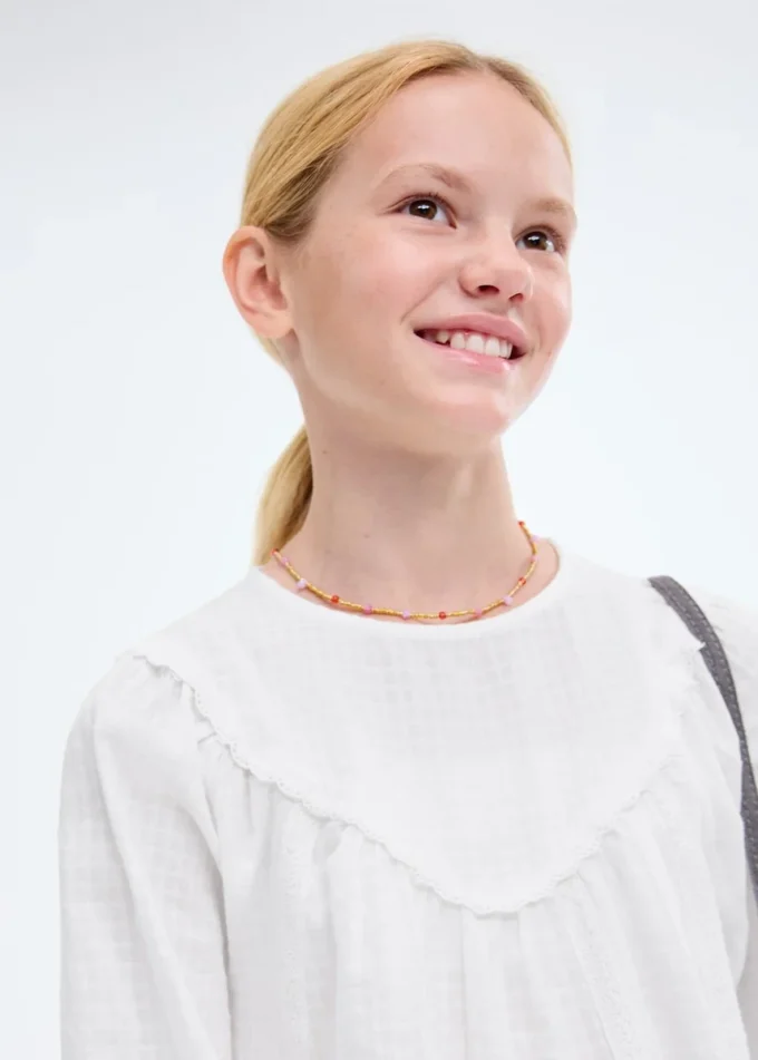 Camicetta con dettagli in pizzo Camicetta con dettagli in pizzo