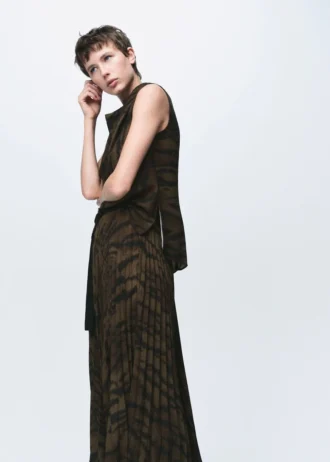 Camicetta con stampa animalier e collo drappeggiato