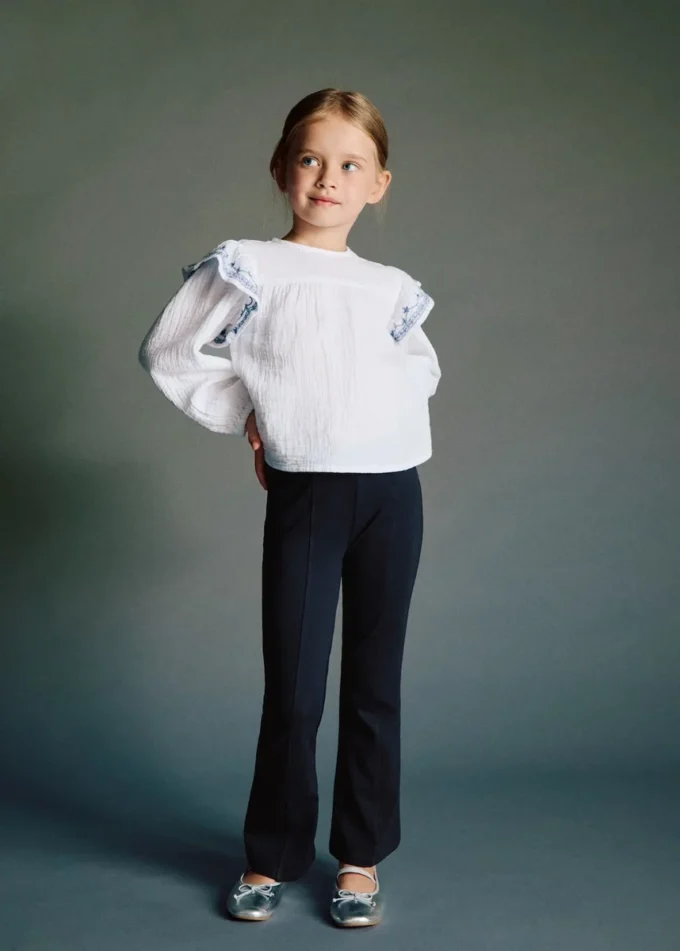 Camicetta con volant ricamati