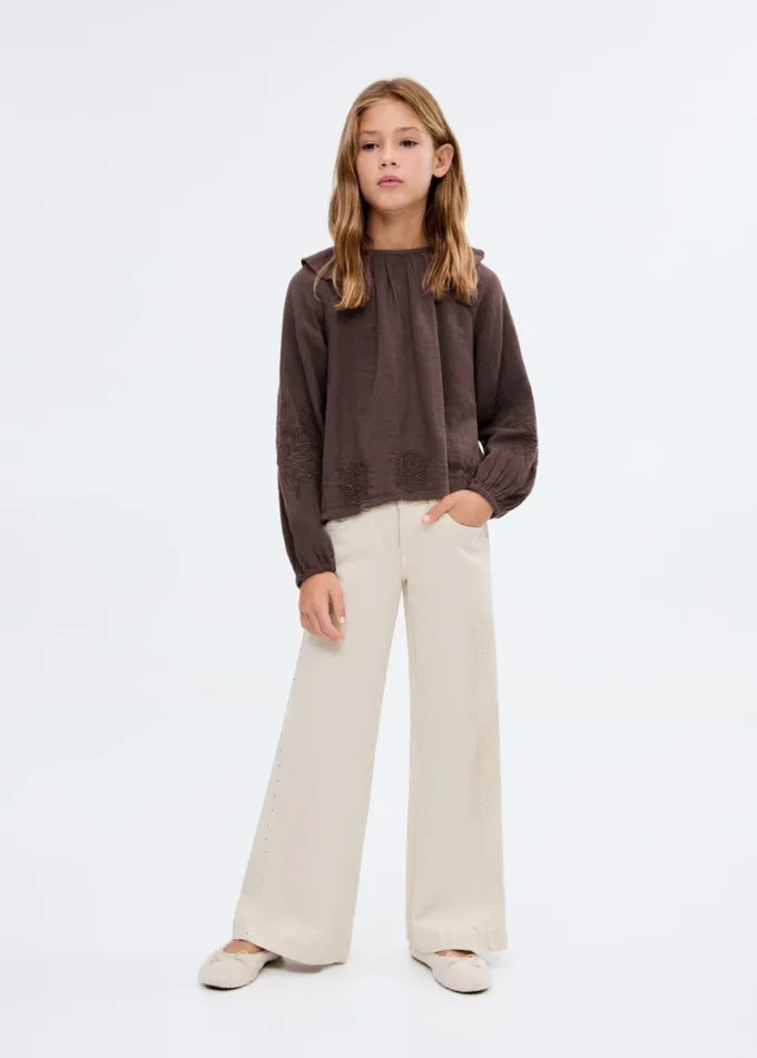 Camicetta con volant ricamati Camicetta con volant ricamati