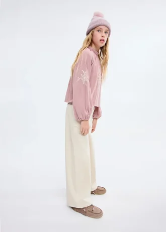 Camicetta in cotone con ricami floreali