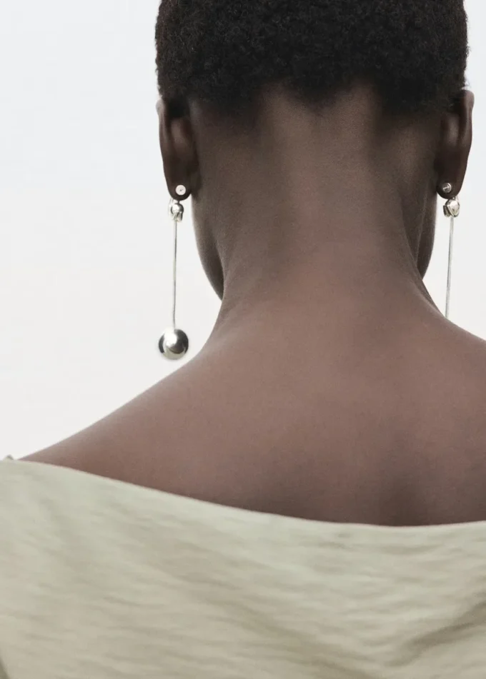 Camicetta in modal con collo asimmetrico Camicetta in modal con collo asimmetrico