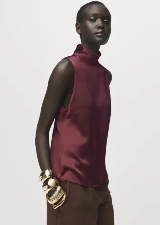 Camicetta in raso con collo alto