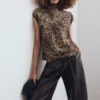 Camicetta in raso con stampa leopardata Camicetta in raso con stampa leopardata