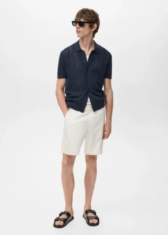 Camicia a righe in maglia con motivo traforato Camicia a righe in maglia con motivo traforato