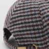 Cappellino in tweed con lettera