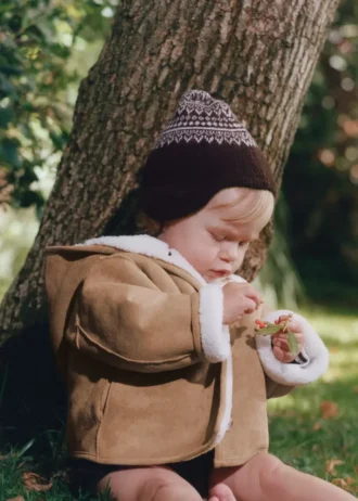 Cappello con pompon e motivo jacquard