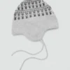 Cappello con pompon e motivo jacquard