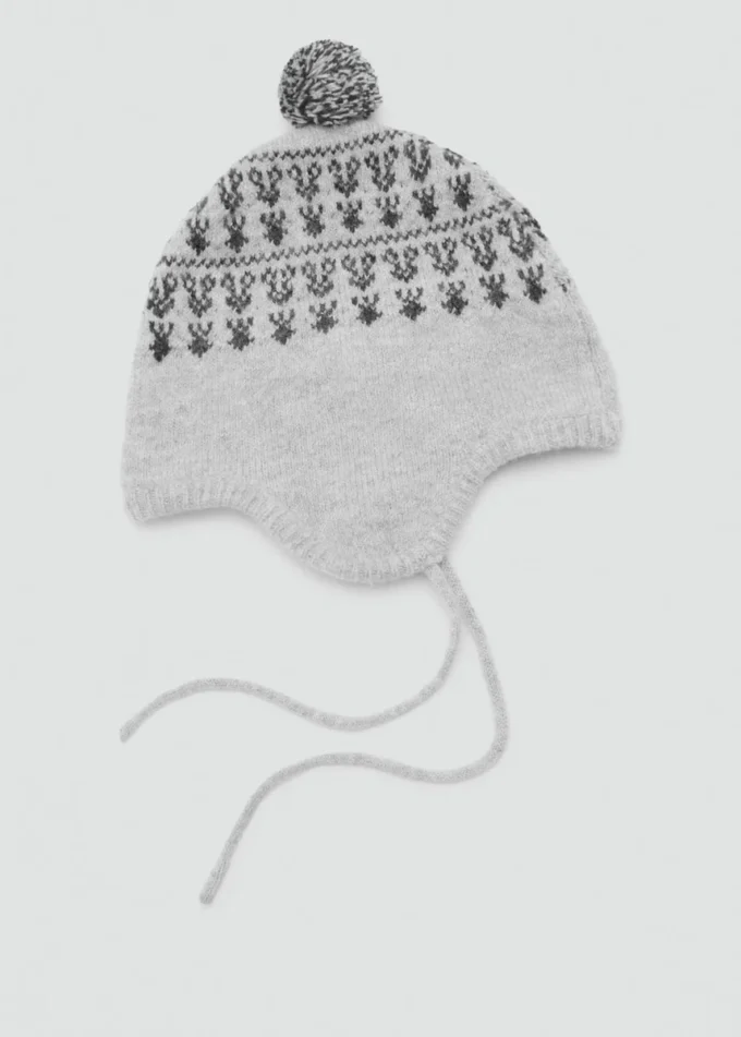 Cappello con pompon e motivo jacquard