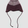 Cappello con pompon e motivo jacquard