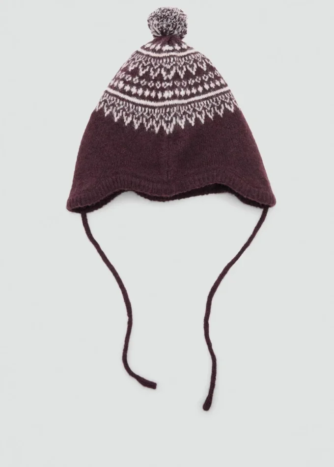 Cappello con pompon e motivo jacquard