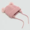 Cappello lavorato a maglia con pompon