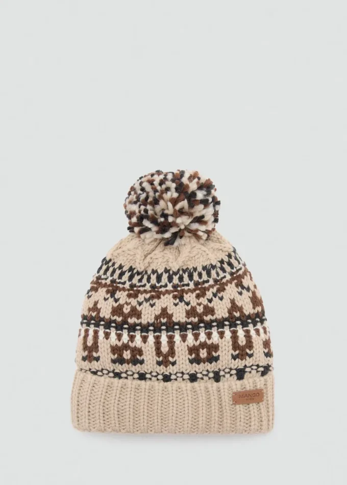 Cappello lavorato a maglia con pompon Cappello lavorato a maglia con pompon