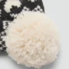 Cappello lavorato a maglia con pompon Cappello lavorato a maglia con pompon