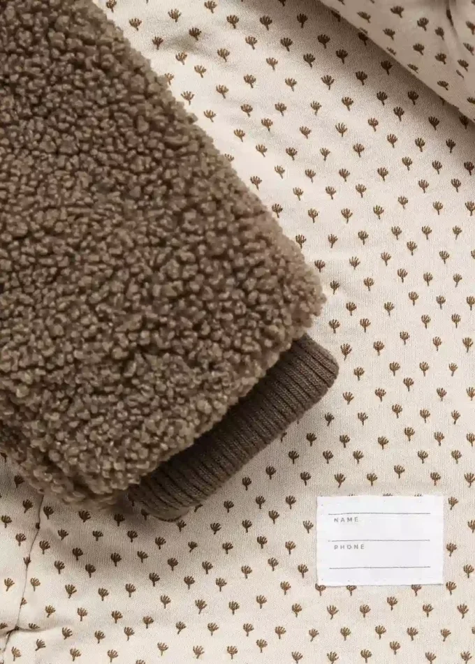 Cappottino con cappuccio e orecchie Cappottino con cappuccio e orecchie