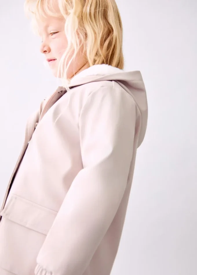 Cappotto gommato con fodera effetto pelliccia