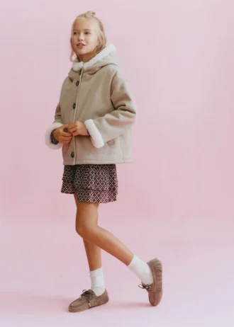 Cappotto in pelliccia e effetto scamosciato