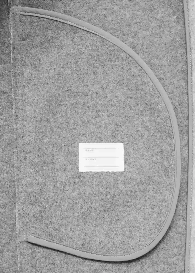 Cappotto in tessuto con tasche Cappotto in tessuto con tasche