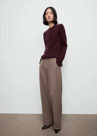 Cardigan in maglia con volant