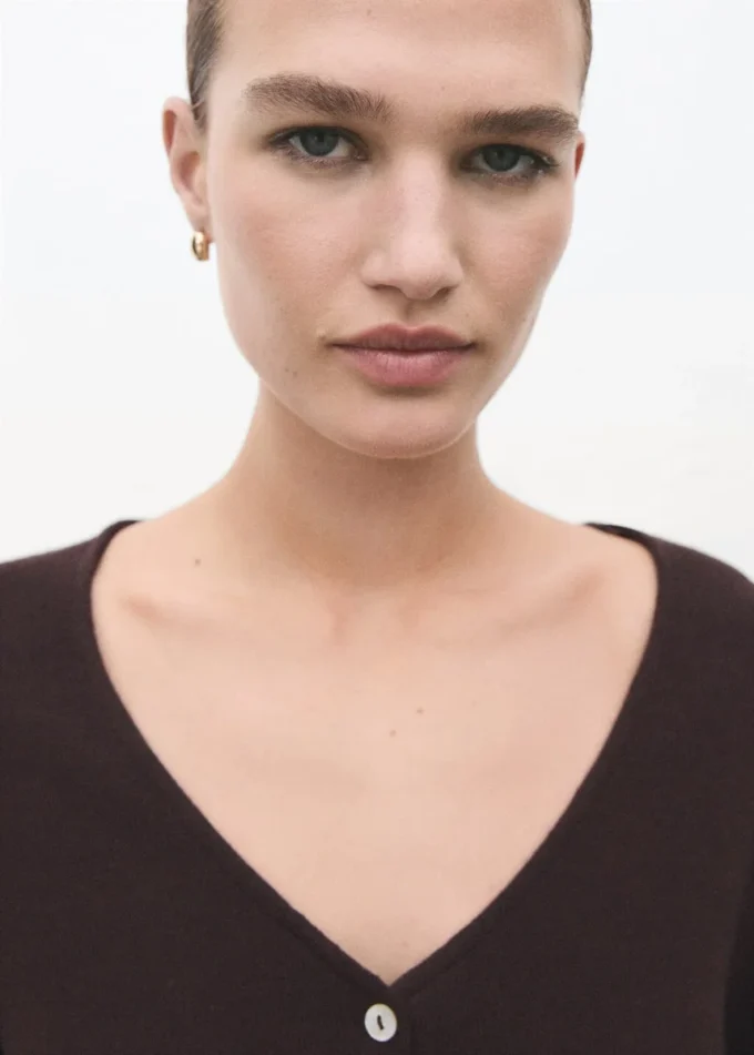 Cardigan lavorato a maglia con fiocco Cardigan lavorato a maglia con fiocco