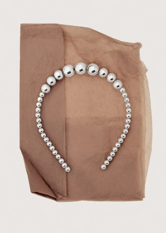 Fascia per capelli con applicazioni di perline Fascia per capelli con applicazioni di perline