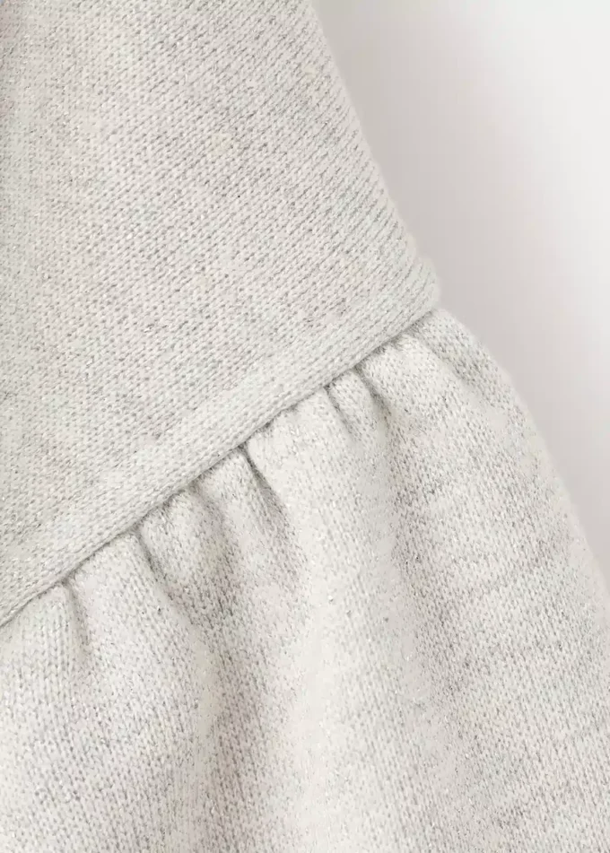 Felpa con decorazioni a stella in strass e dettagli in lurex Felpa con decorazioni a stella in strass e dettagli in lurex