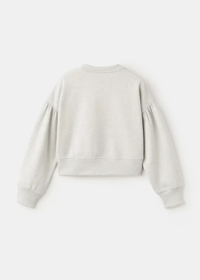 Felpa con decorazioni a stella in strass e dettagli in lurex Felpa con decorazioni a stella in strass e dettagli in lurex