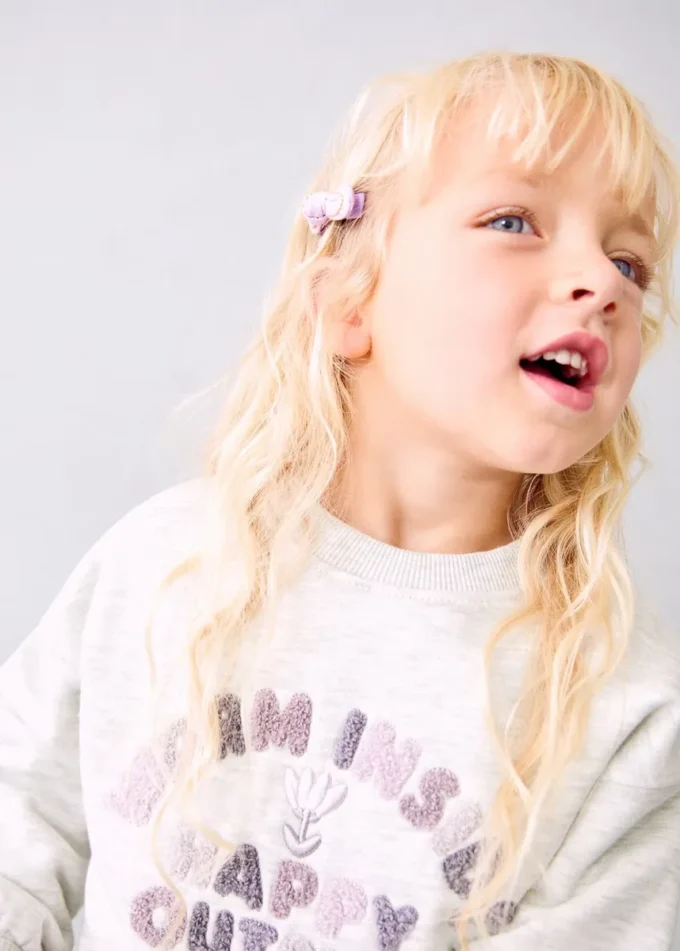 Felpa con ricami floreali Felpa con ricami floreali