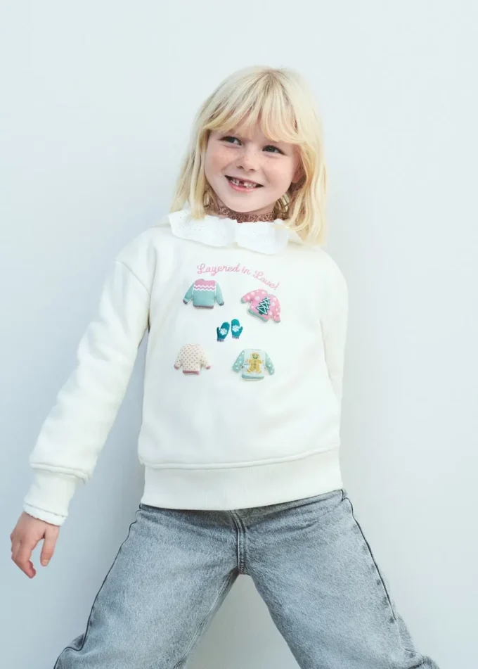 Felpa con toppa Felpa con toppa