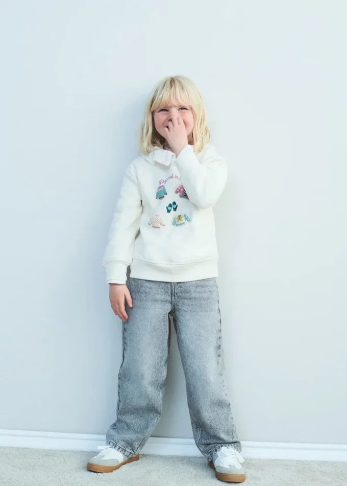 Felpa con toppa Felpa con toppa