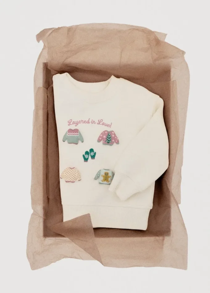 Felpa con toppa Felpa con toppa