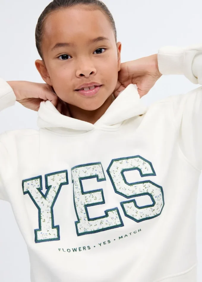 Felpa ricamata con motivo floreale