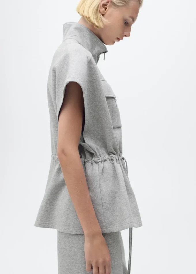 Giacca a maniche corte con cintura regolabile in vita Giacca a maniche corte con cintura regolabile in vita